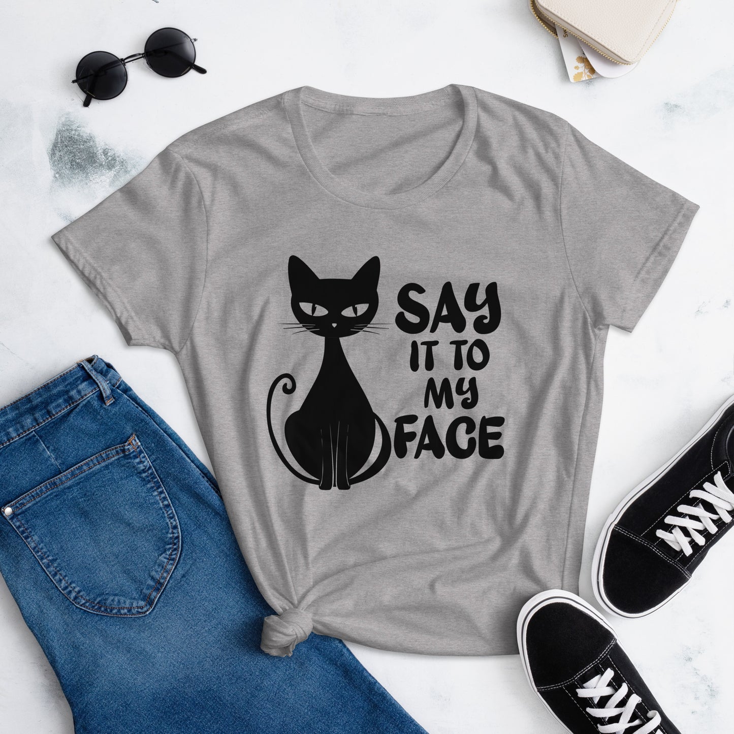 Heather Grey t-shirt featuring a black bold and sassy graphic of a cat with the words 'Say It To My Face,' representing confidence and attitude. Perfect for women who embrace their inner feline and want to make a statement with their fashion.