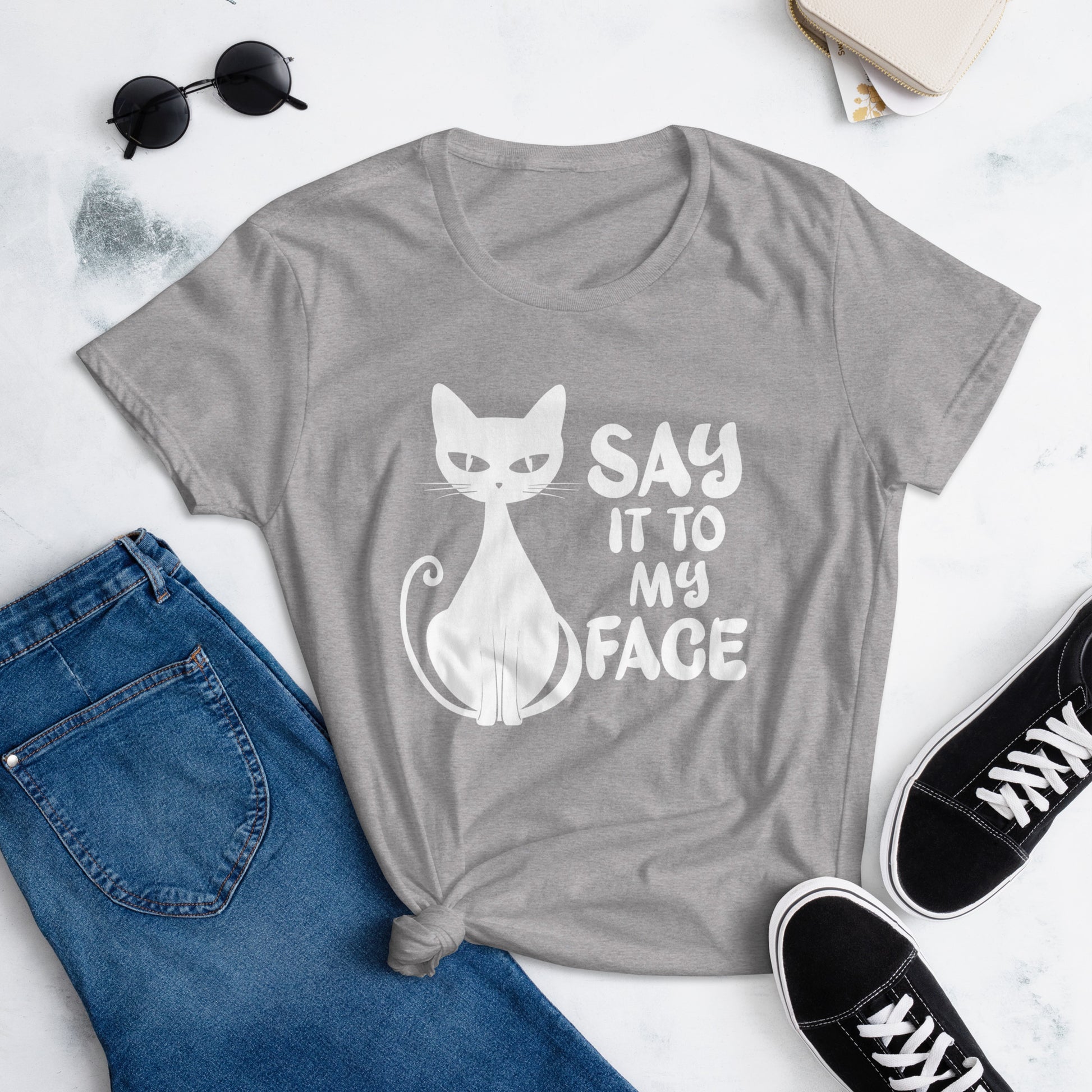 Heather Grey t-shirt featuring a white bold and sassy graphic of a cat with the words 'Say It To My Face,' representing confidence and attitude. Perfect for women who embrace their inner feline and want to make a statement with their fashion.