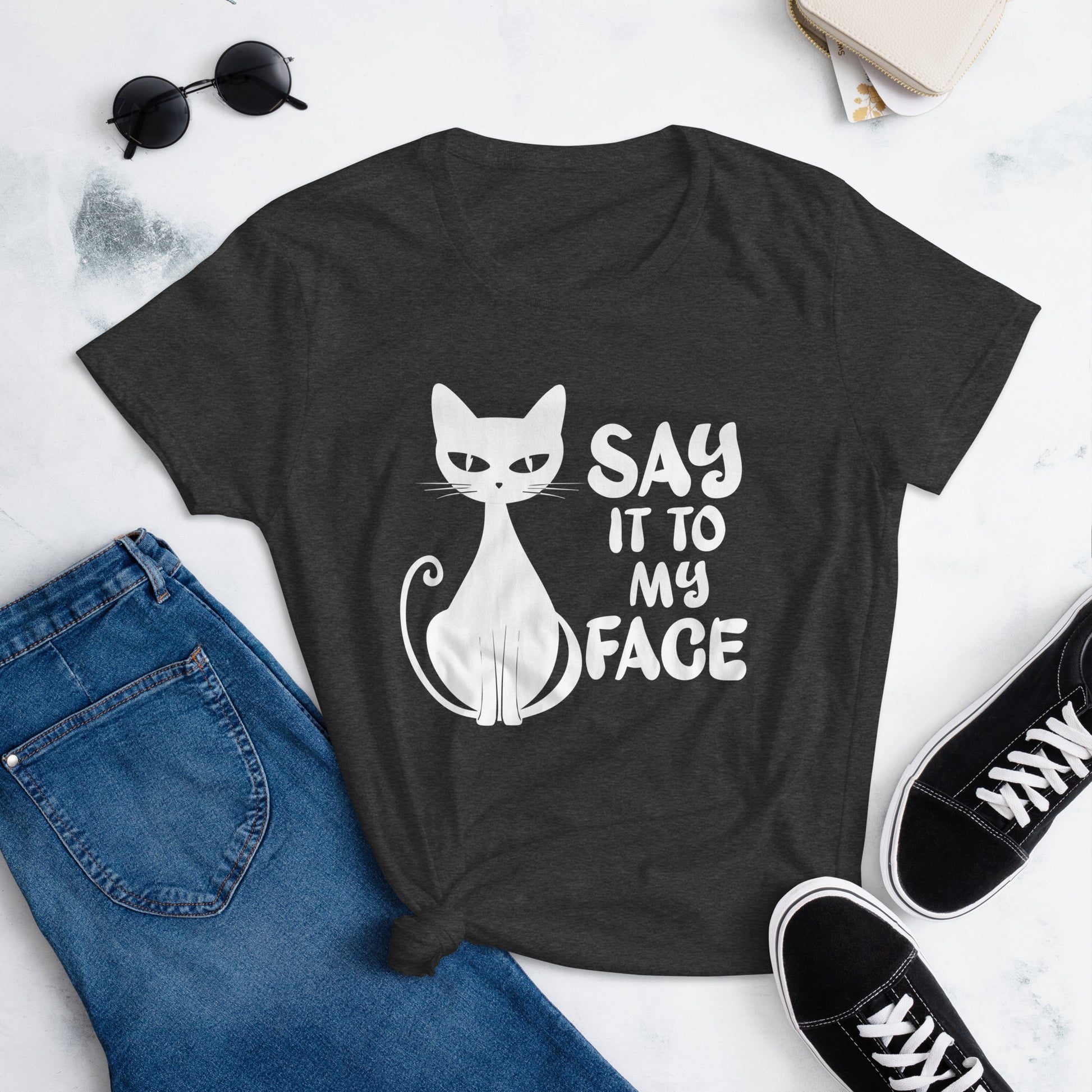 Heather Dark Grey t-shirt featuring a white bold and sassy graphic of a cat with the words 'Say It To My Face,' representing confidence and attitude. Perfect for women who embrace their inner feline and want to make a statement with their fashion.