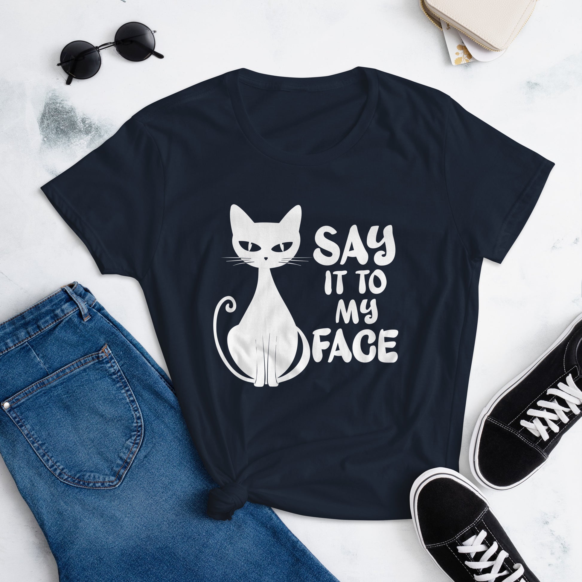 Navy t-shirt featuring a white bold and sassy graphic of a cat with the words 'Say It To My Face,' representing confidence and attitude. Perfect for women who embrace their inner feline and want to make a statement with their fashion.