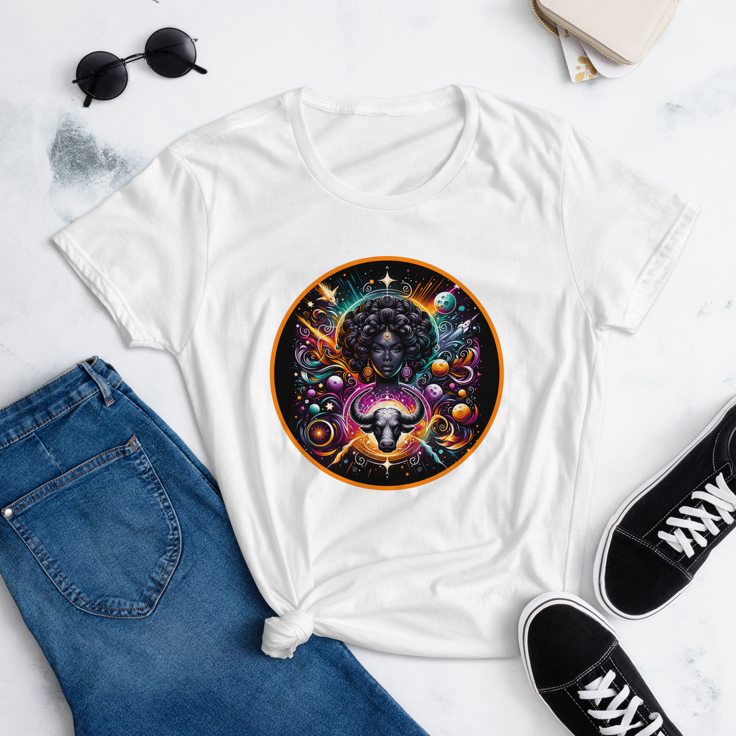 An enchanting Taurus Zodiac Wonders design on a T-shirt, highlighting a powerful Black woman, celestial bodies, and a mythological bull amidst a vibrant cosmic backdrop.