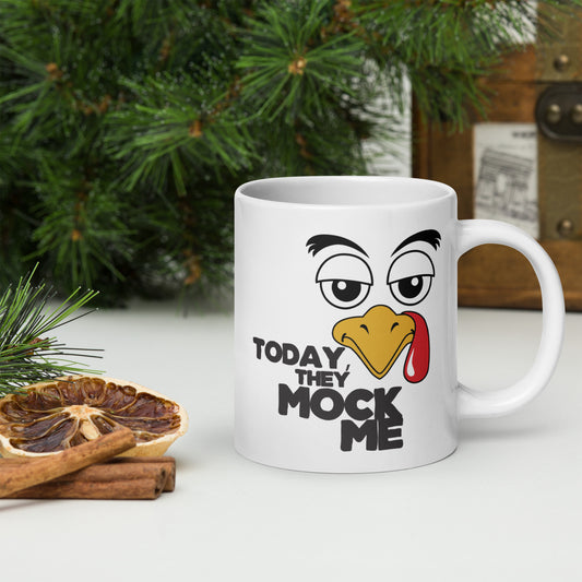 Illustration of a turkey with a mocking expression and the text 'Today, They Mock Me' in bold letters on a white ceramic mug. 20oz