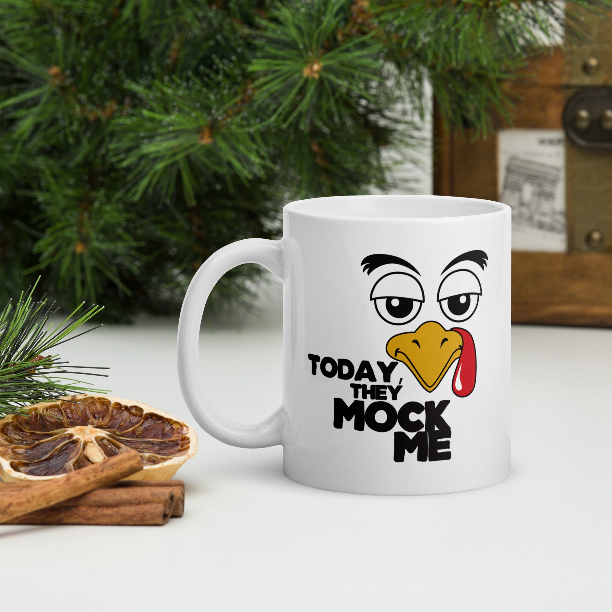 Illustration of a turkey with a mocking expression and the text 'Today, They Mock Me' in bold letters on a white ceramic mug. 11oz