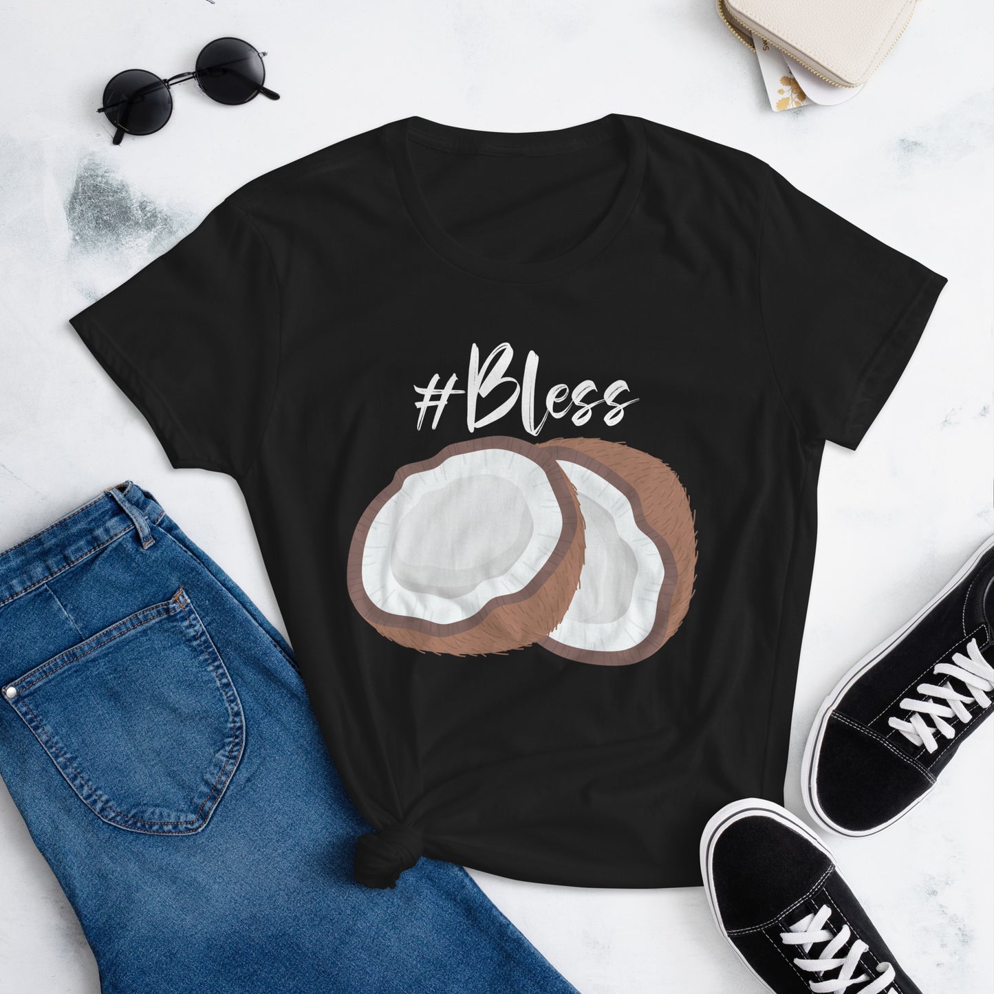 Graphic of a t-shirt featuring a vibrant coconut design and the hashtag #Bless, women.