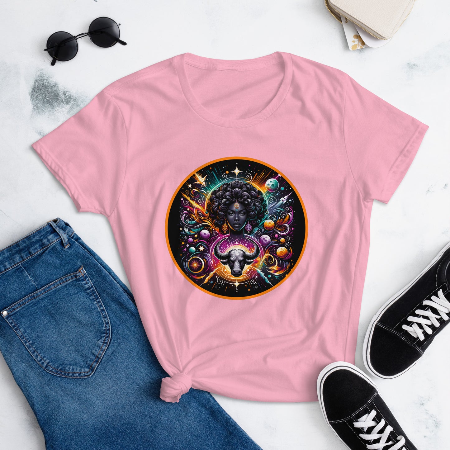 An enchanting Taurus Zodiac Wonders design on a T-shirt, highlighting a powerful Black woman, celestial bodies, and a mythological bull amidst a vibrant cosmic backdrop.