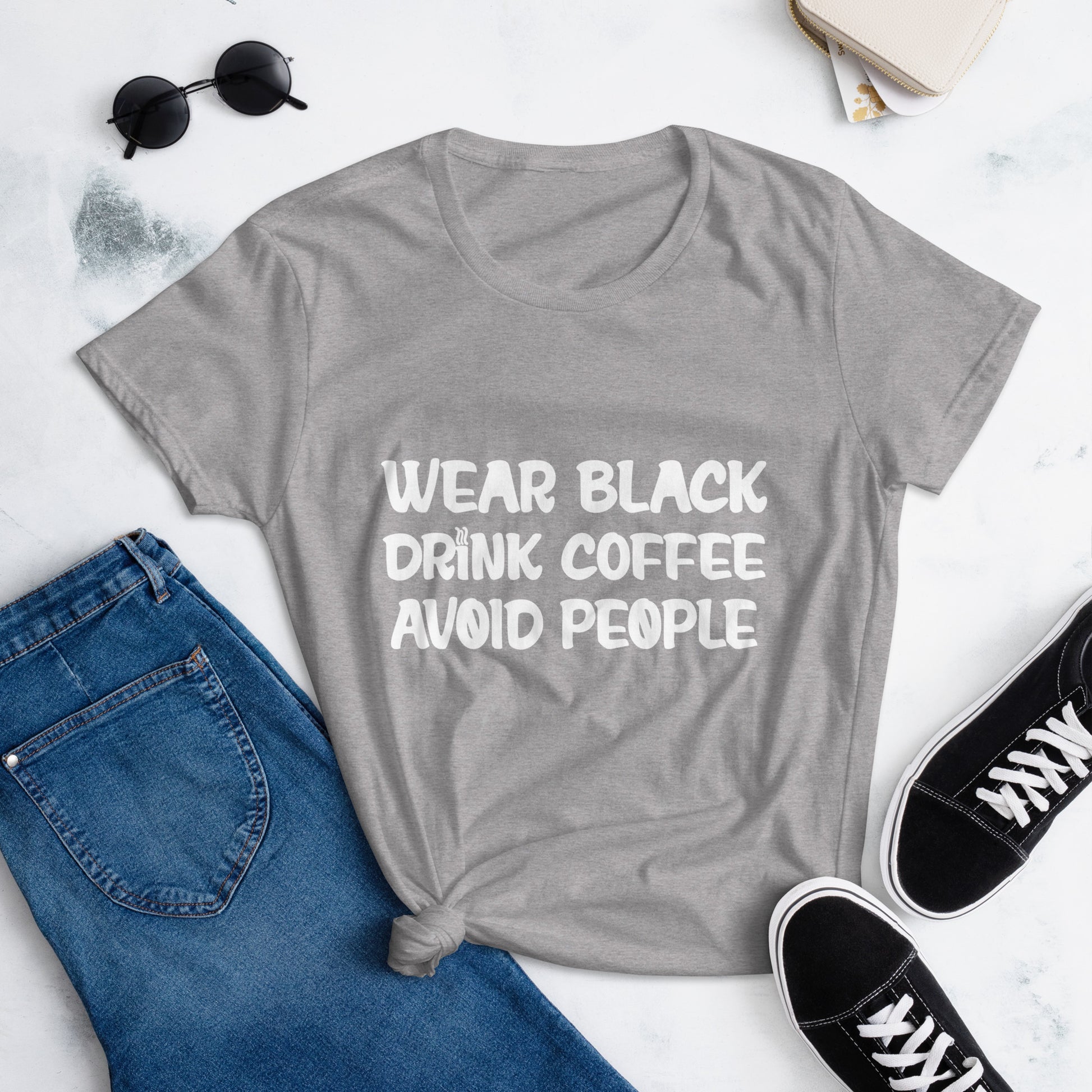 Black t-shirt with bold white text that reads 'Black, Coffee, People' designed for coffee lovers and introverts. The shirt features a minimalist design, emphasizing a love for coffee and quiet moments, perfect for casual wear.